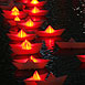 VOYAGE A FLOTILLA of 300 illuminated miniature boats